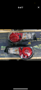 Pair of Fr-s JDM tail lights. Chip found in corner of housing. See photos. No damage to lens.